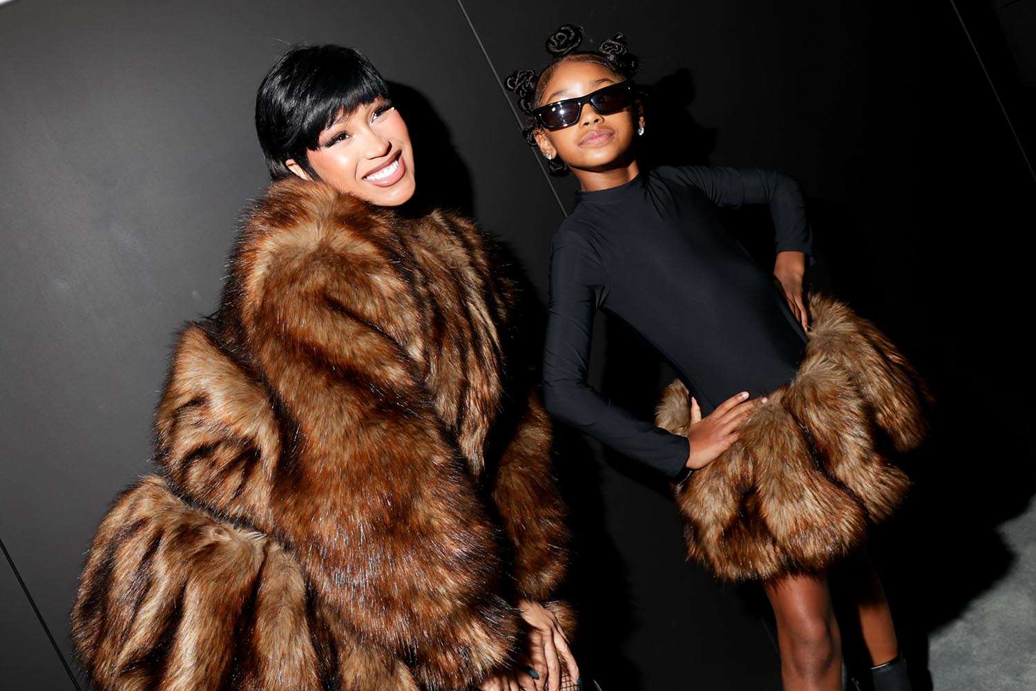 Cardi B and Kulture at Alexander Wang Spring/Summer 2026 fashion show