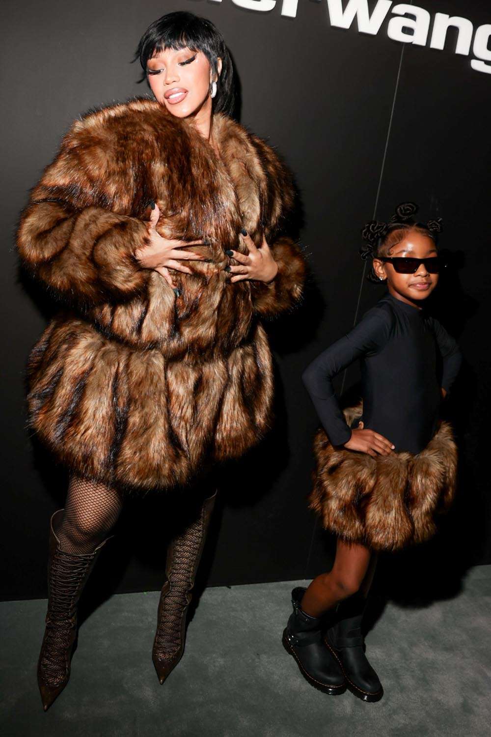 Cardi B and Kulture at Alexander Wang Spring/Summer 2026 fashion show