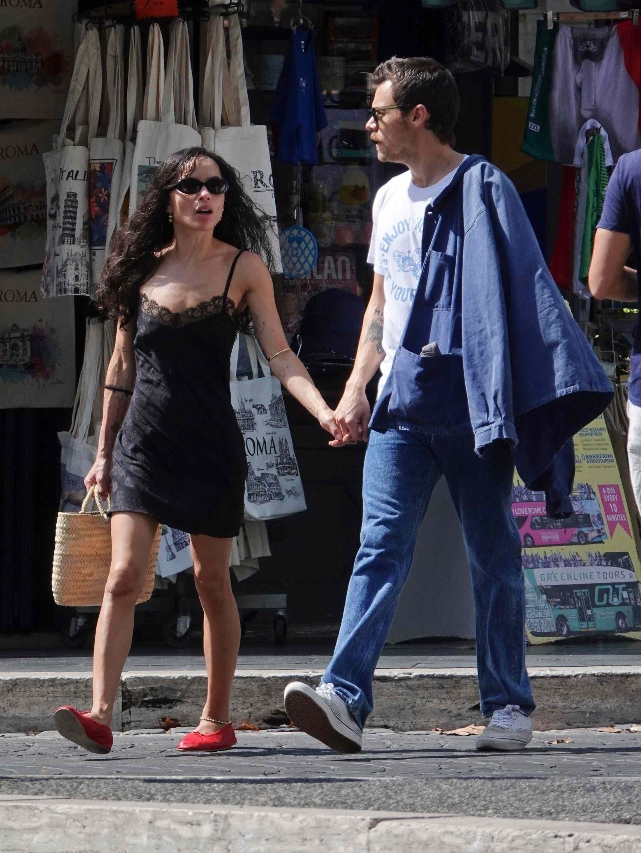 Harry Styles and Zoe Kravitz are seen packing on the PDA during a stroll through the eternal city of Rome, Italy.