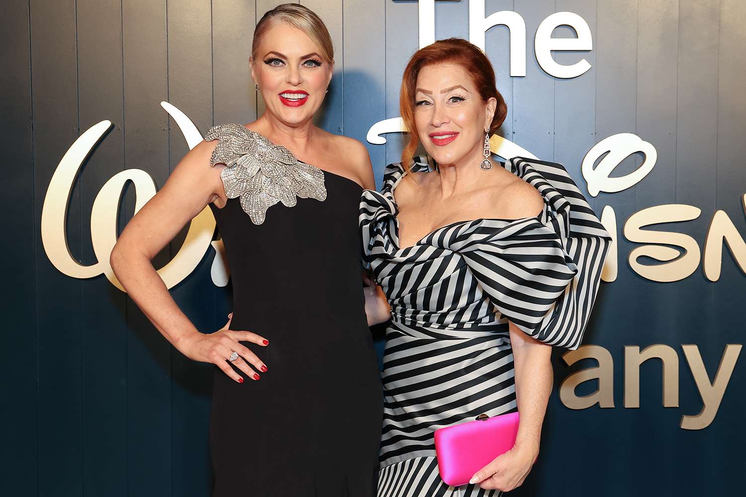 Elaine Hendrix and Lisa Ann Walter attend The Walt Disney Company