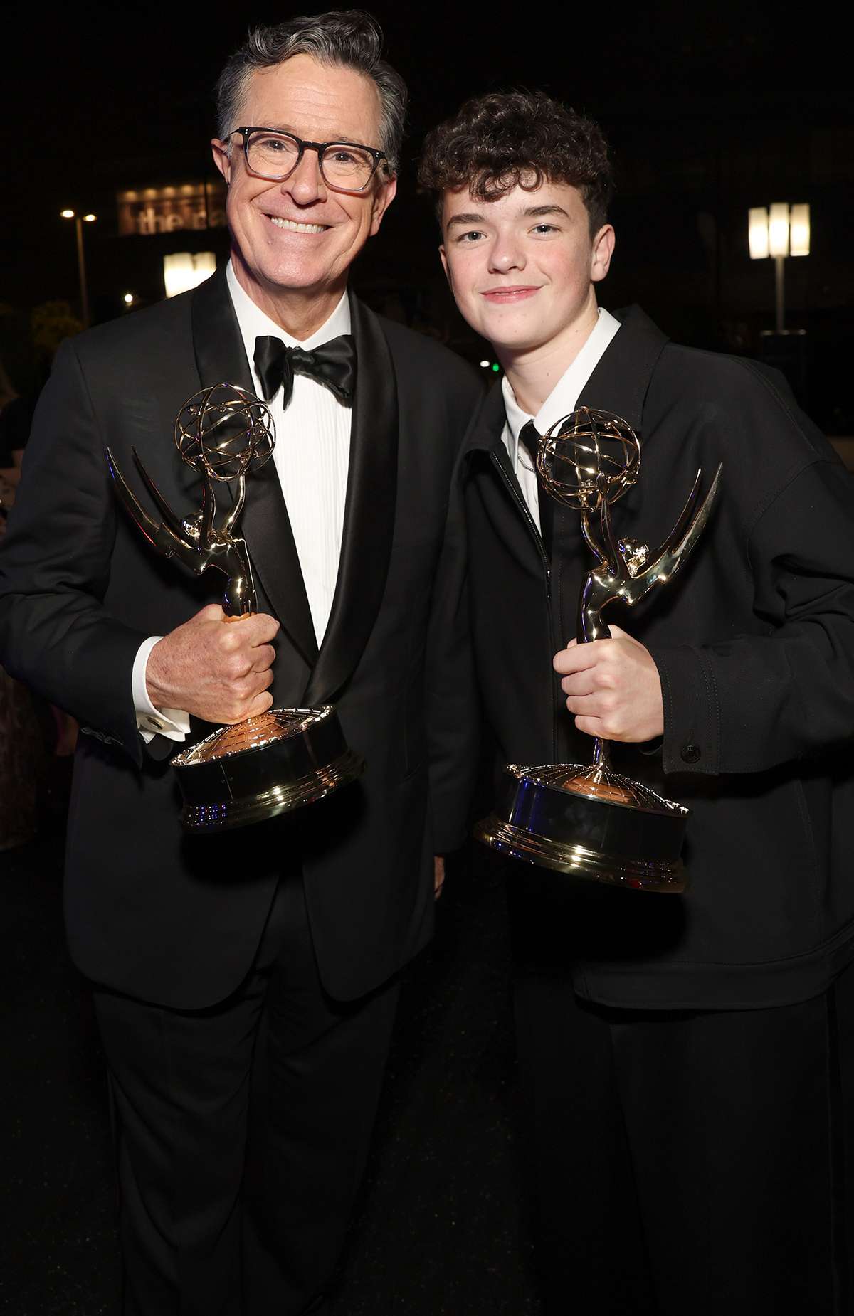 Stephen Colbert and Owen Cooper enjoy the 77th Emmy Awards Governors Gala