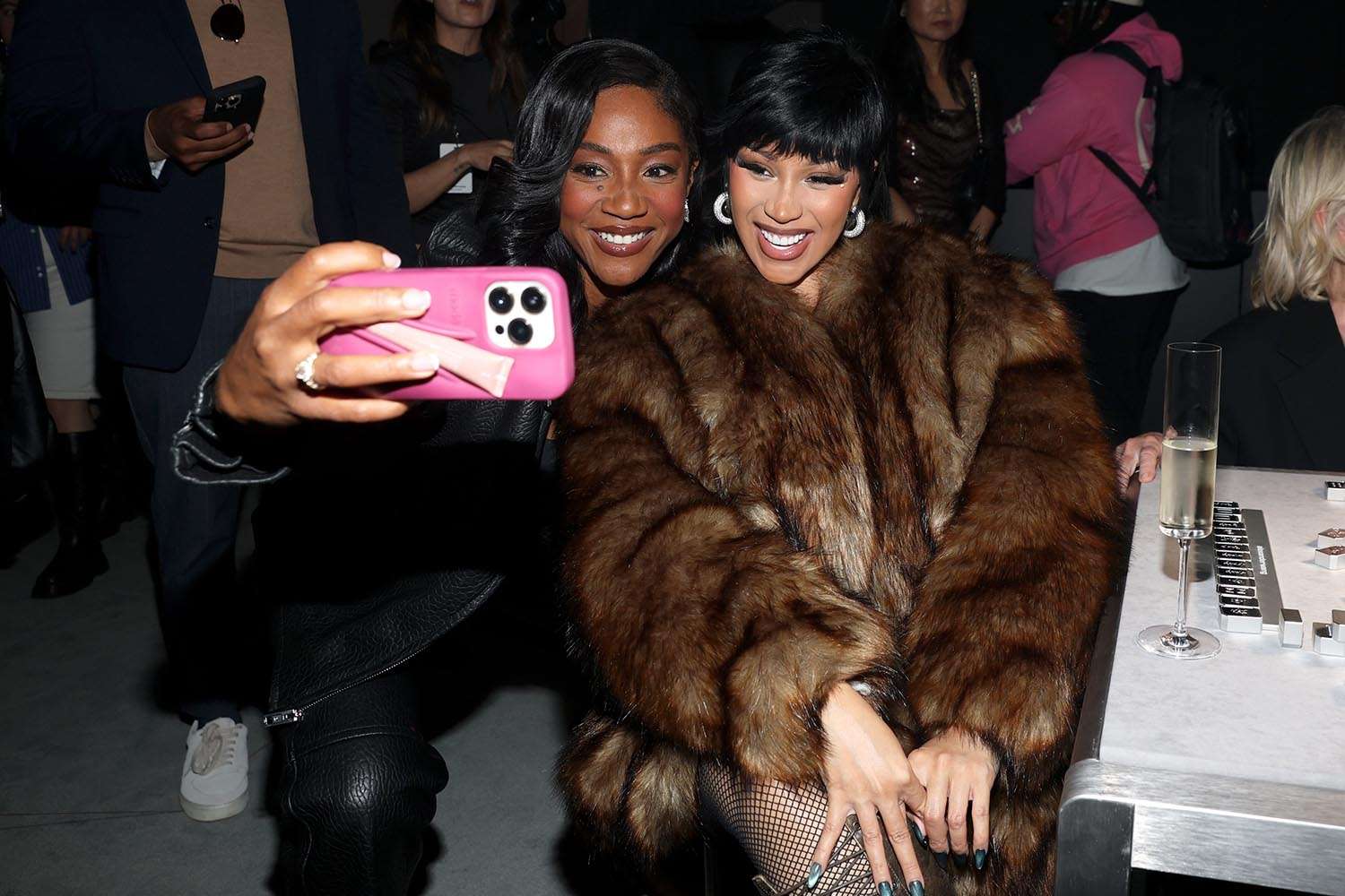Tiffany Haddish and Cardi B attend the Alexander Wang show during September 2025 New York Fashion Week on September 12, 2025 in New York City.