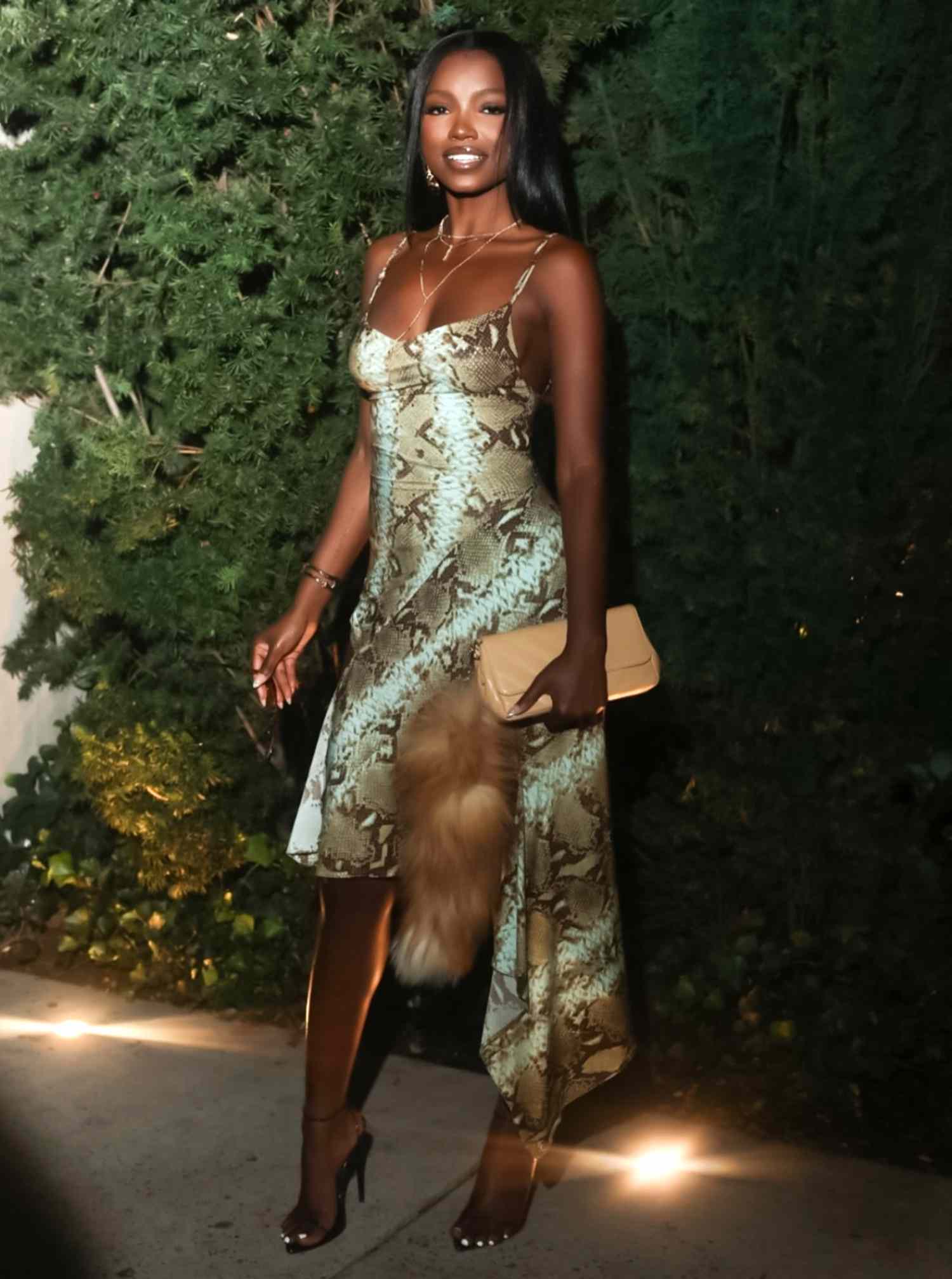 Chelley, entertainer, model, and actress, stuns in Theophilio as she leaves Law Roach x What Goes Around Comes Around