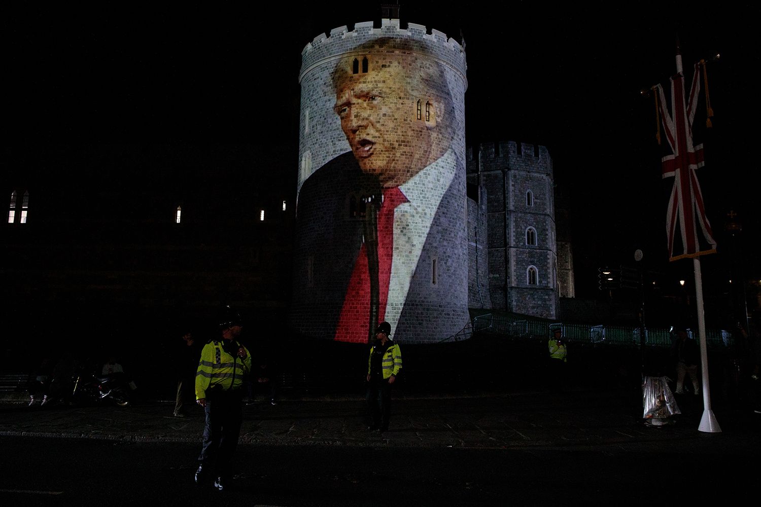 Political campaign group Led By Donkeys project an image of Donald Trump onto Windsor Castle as US President Trump