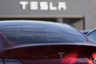Federal Safety Regulators Launch Broad Probe into Tesla Model Y Door Handle Failures After Reports of Trapped Children