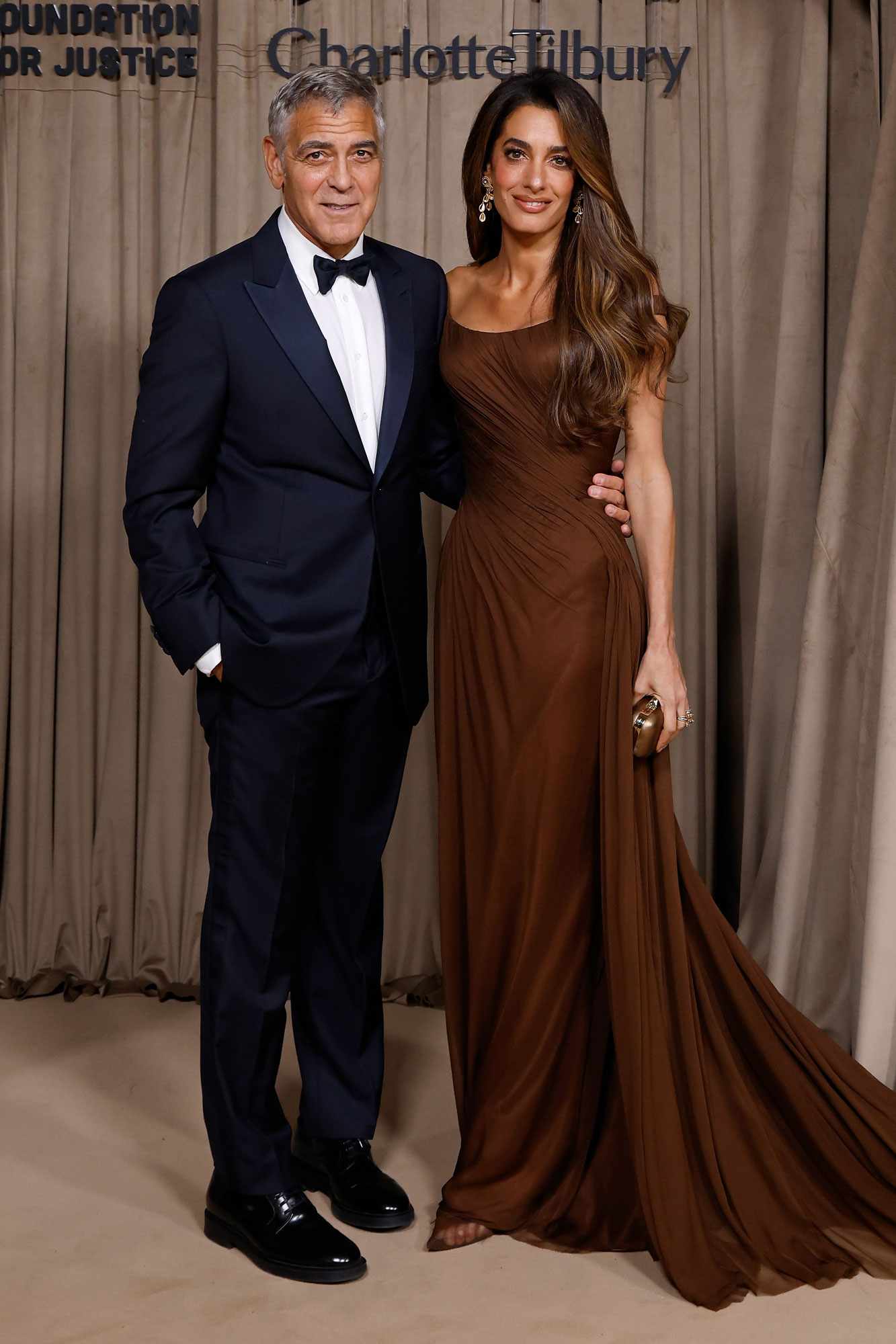 George Clooney and Amal Clooney attend the Clooney Foundation For Justice