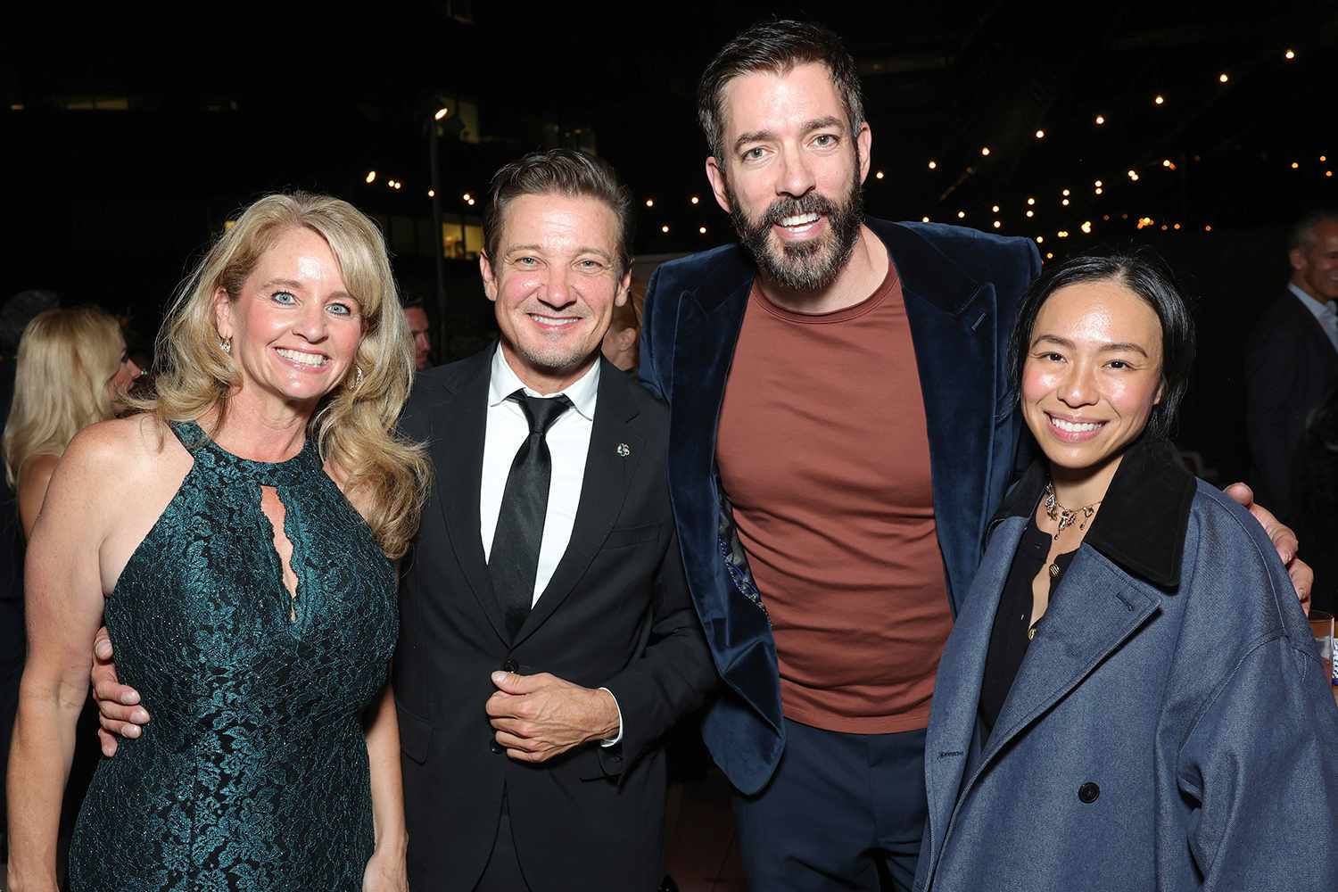 Kym Renner, Jeremy Renner, Drew Scott and Linda Scott attend A Sense of Home Gala