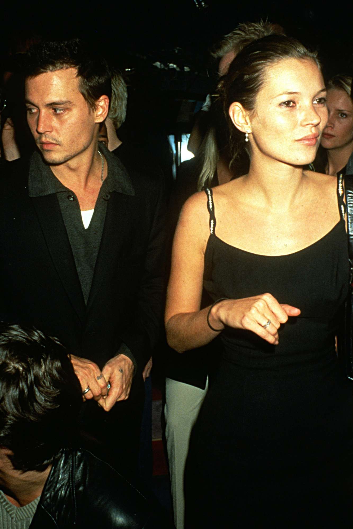 Johnny Depp and Kate Moss at a 1990s fashion week party