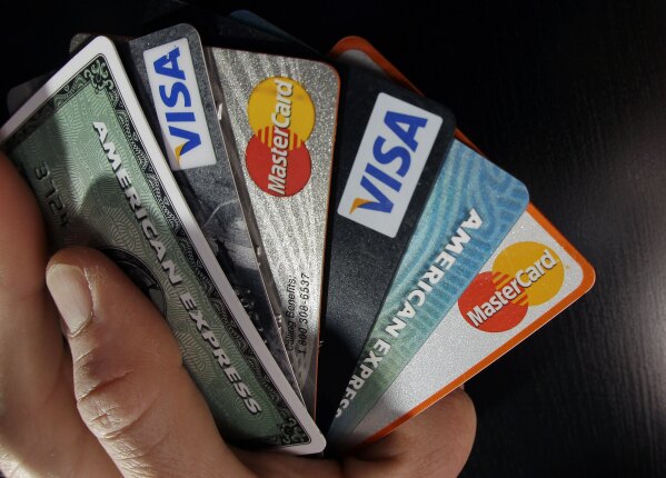 consumer credit cards are posed in North Andover, Mass.