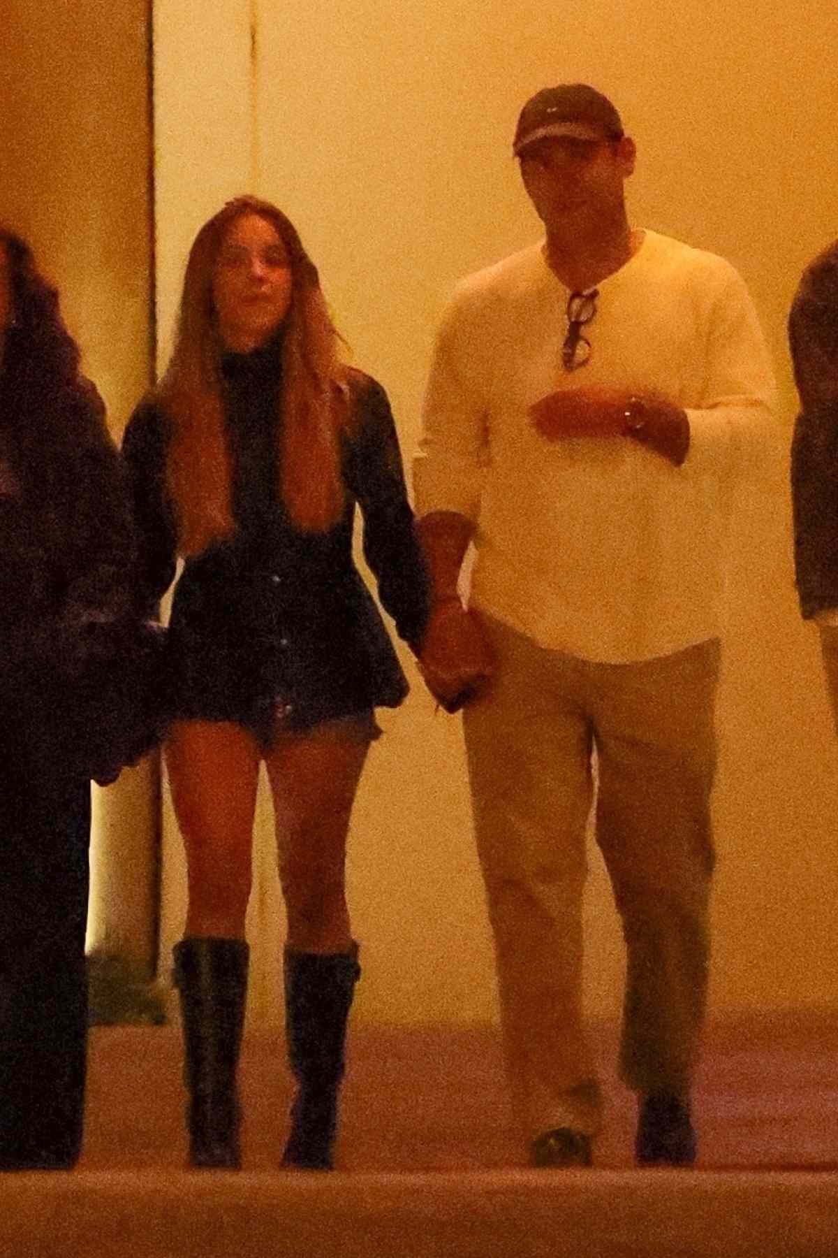 Sydney Sweeney and Scooter Braun making a sneaky exit from dinner