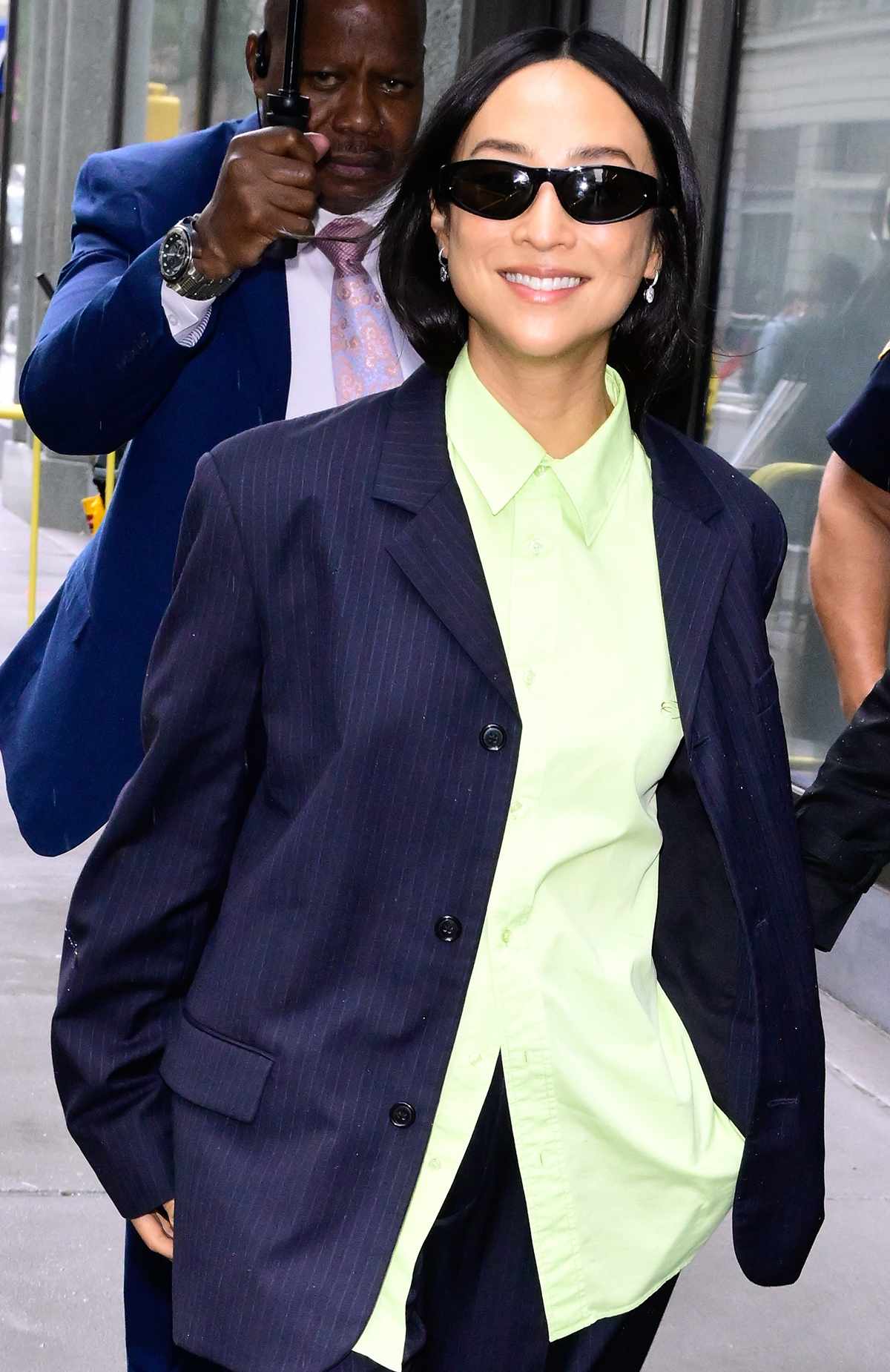 Greta Lee is seen outside 