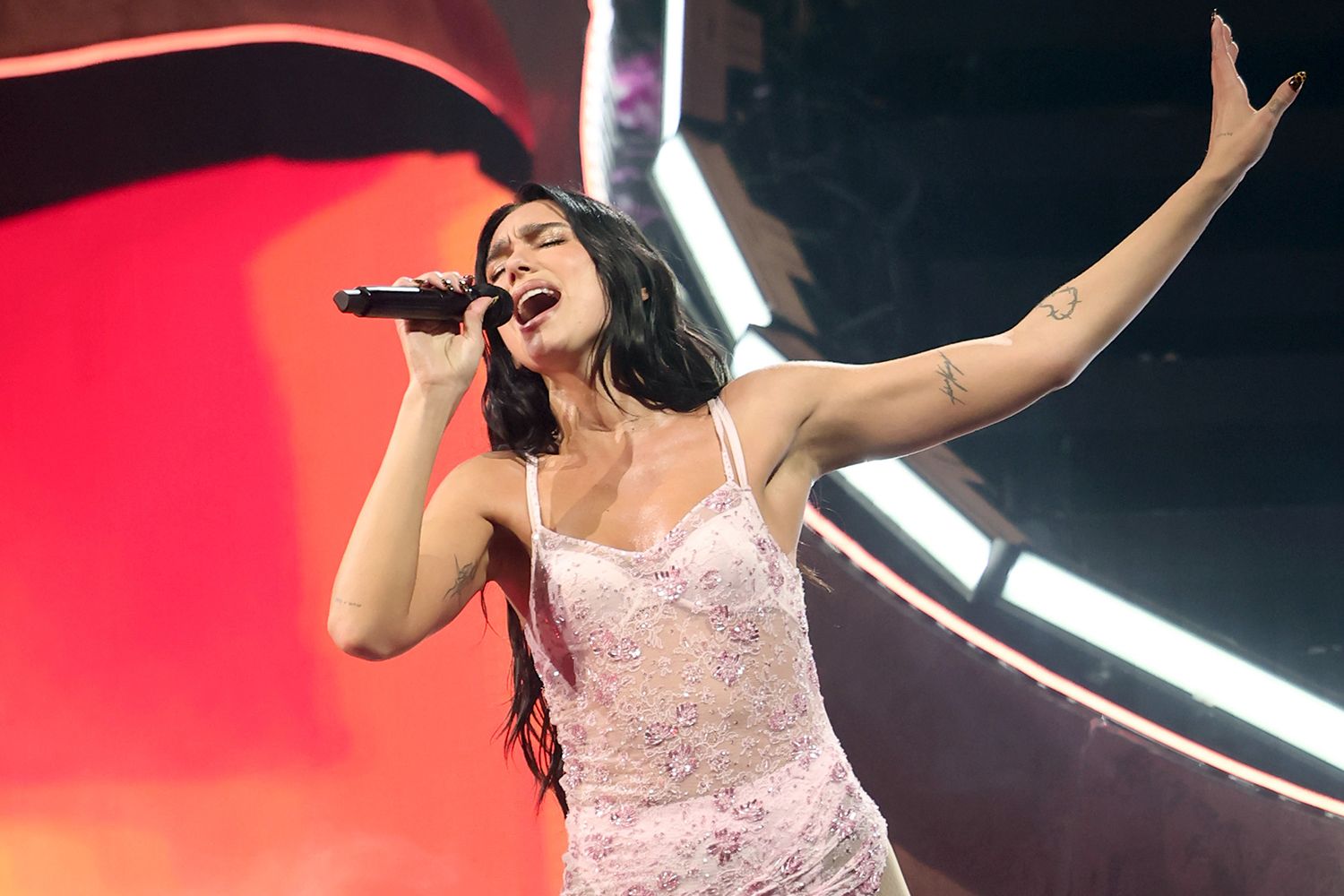Dua Lipa performs onstage at The Kia Forum