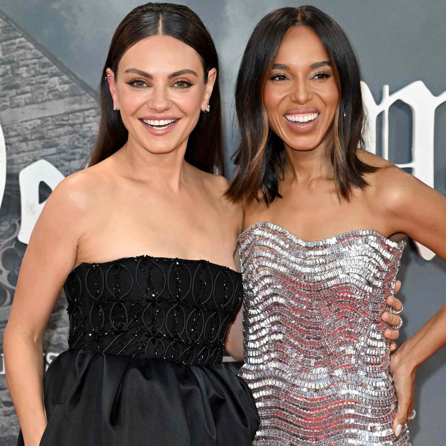 Mila Kunis and Kerry Washington attend the 