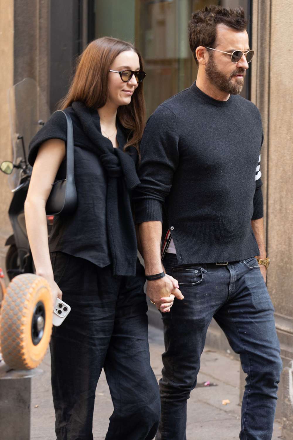 Nicole Brydon and Justin Theroux are seen on October 08, 2025 in Milan, Italy,
