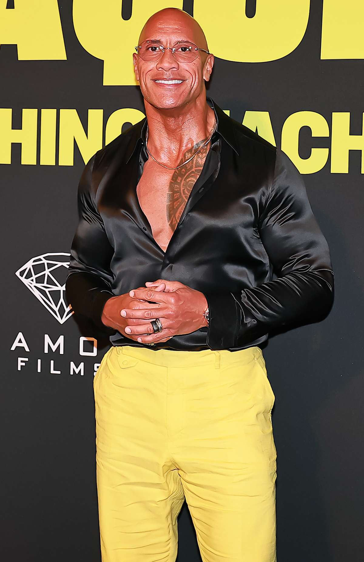 Dwayne "The Rock" Johnson is seen during the fan event for The Smashing Machine movie