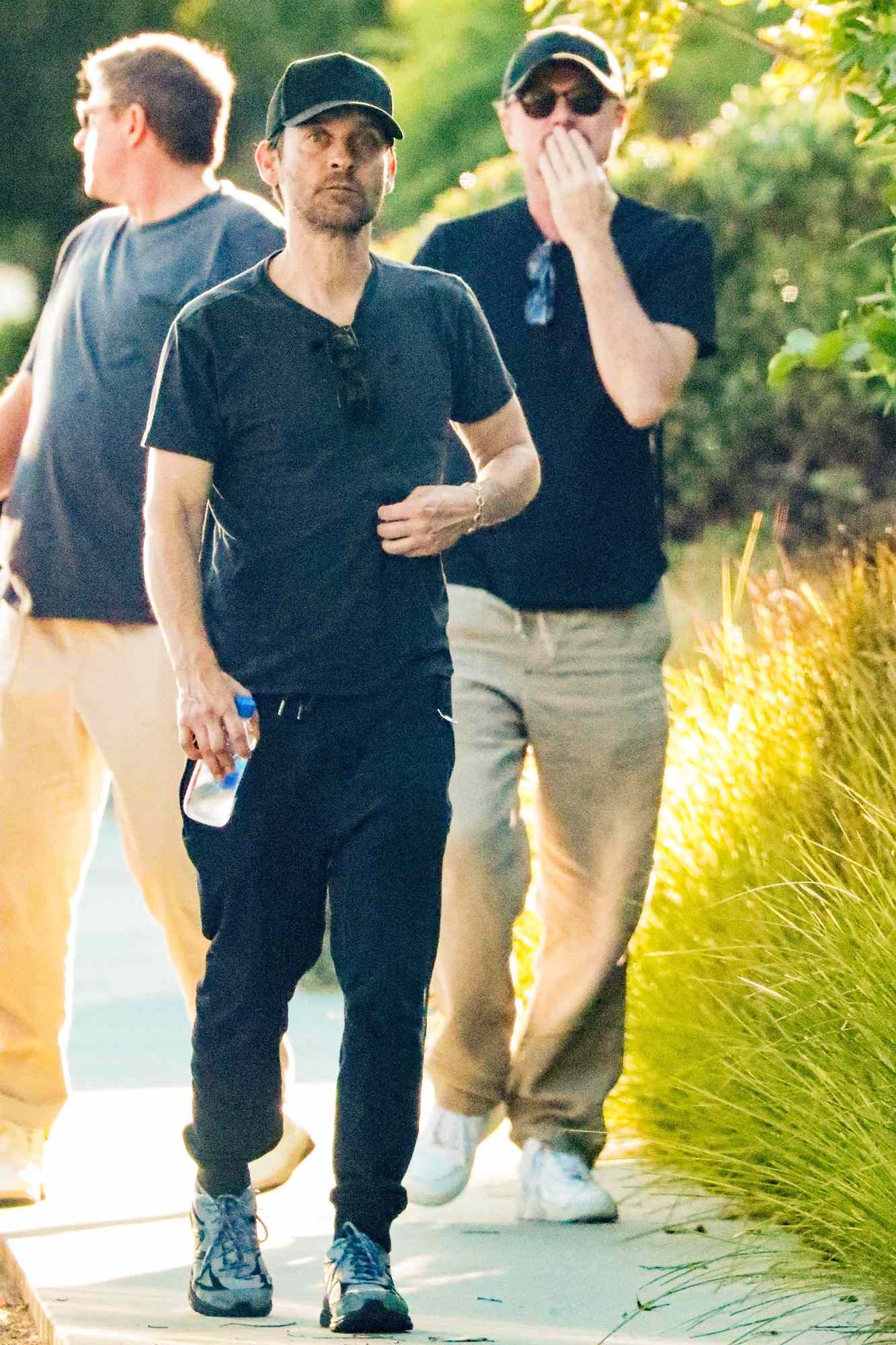 Leonardo DiCaprio and Tobey Maguire attend the cocktail reception of the Leonardo DiCaprio Foundation 4th Annual Saint-Tropez Gala at Domaine Bertaud Belieu