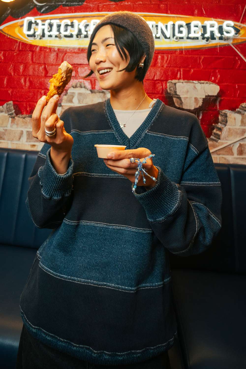 No demons, just delicious Chicken Fingers! KPop Demon Hunters star May Hong stopped by the Raising Cane