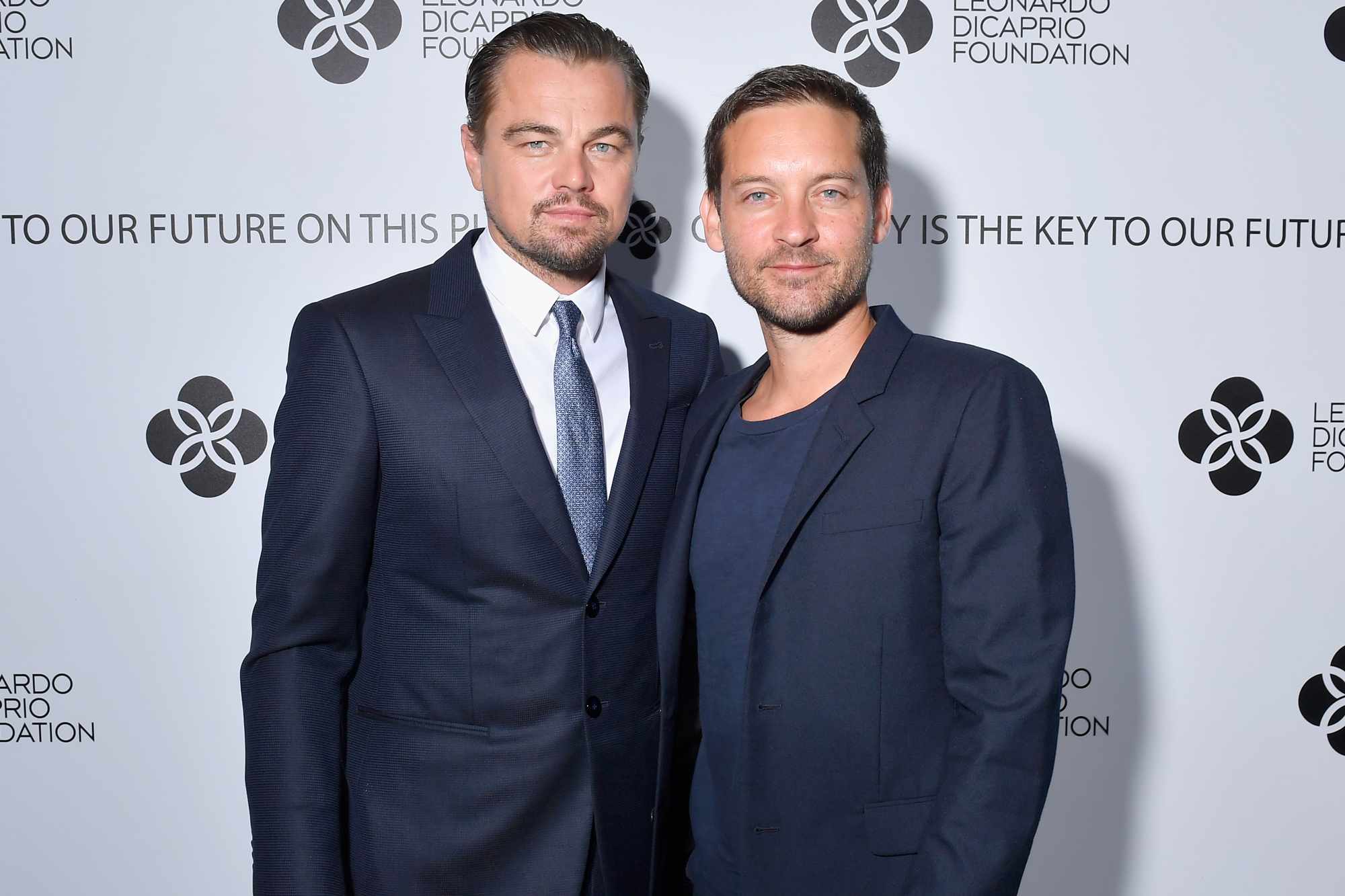 Leonardo DiCaprio and Tobey Maguire attend the cocktail reception of the Leonardo DiCaprio Foundation 4th Annual Saint-Tropez Gala at Domaine Bertaud Belieu