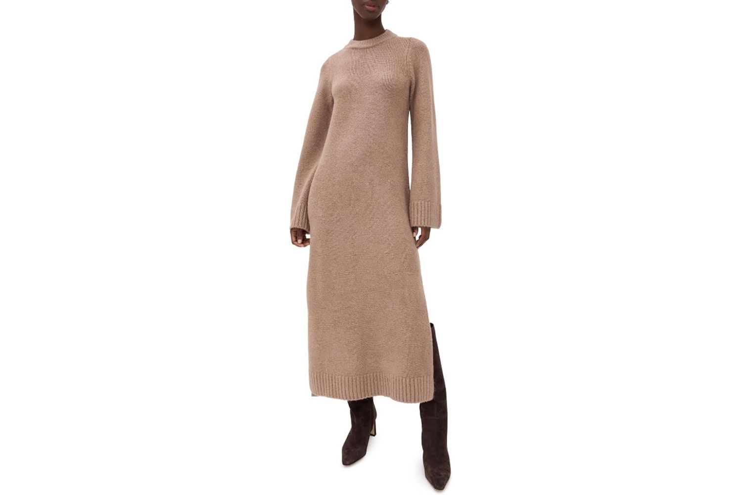 Person wearing a long sweater dress and boots