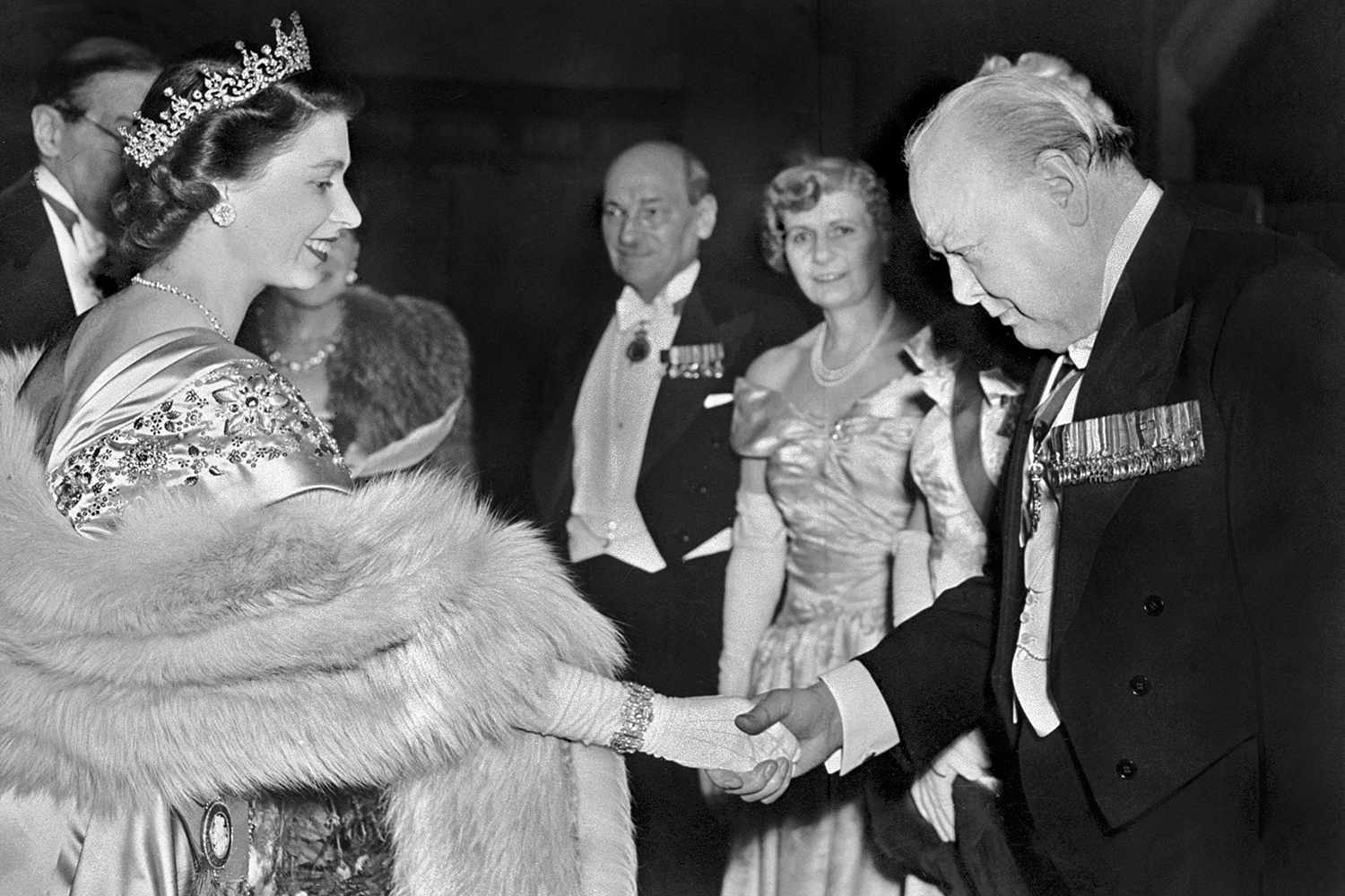 The Princess Elizabeth of Great Britain greets Winston Churchill at a Guildhall reception, 23 March 1950 in London