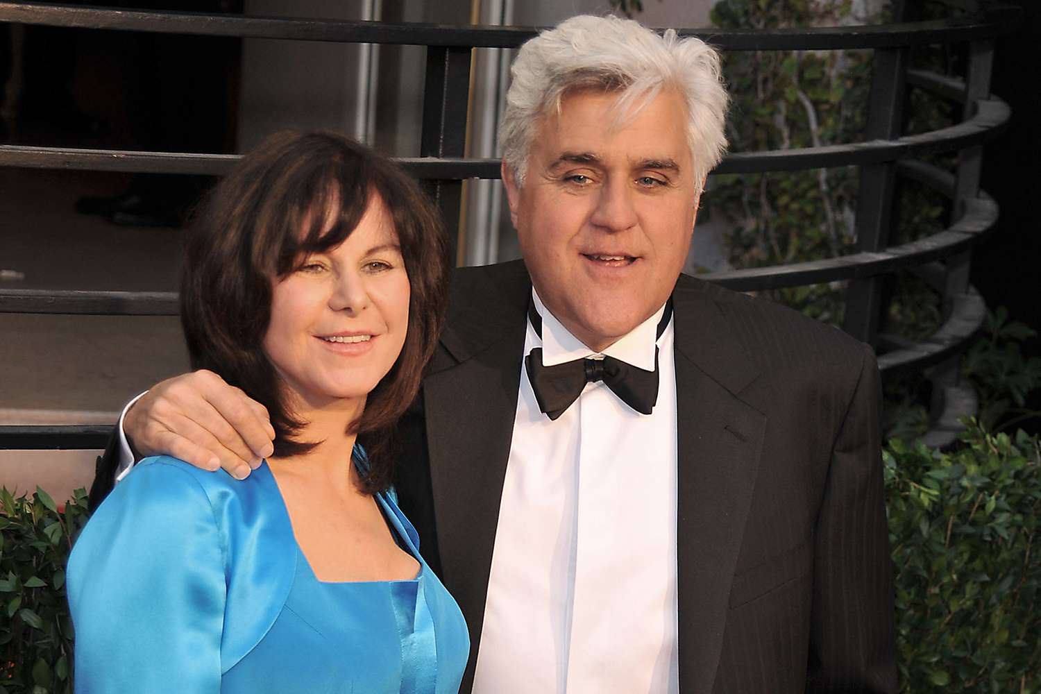 TV personality Jay Leno (R) and Mavis Leno arrive at the 2010 Vanity Fair Oscar Party hosted by Graydon Carter held at Sunset Tower on March 7, 2010 in West Hollywood, California.