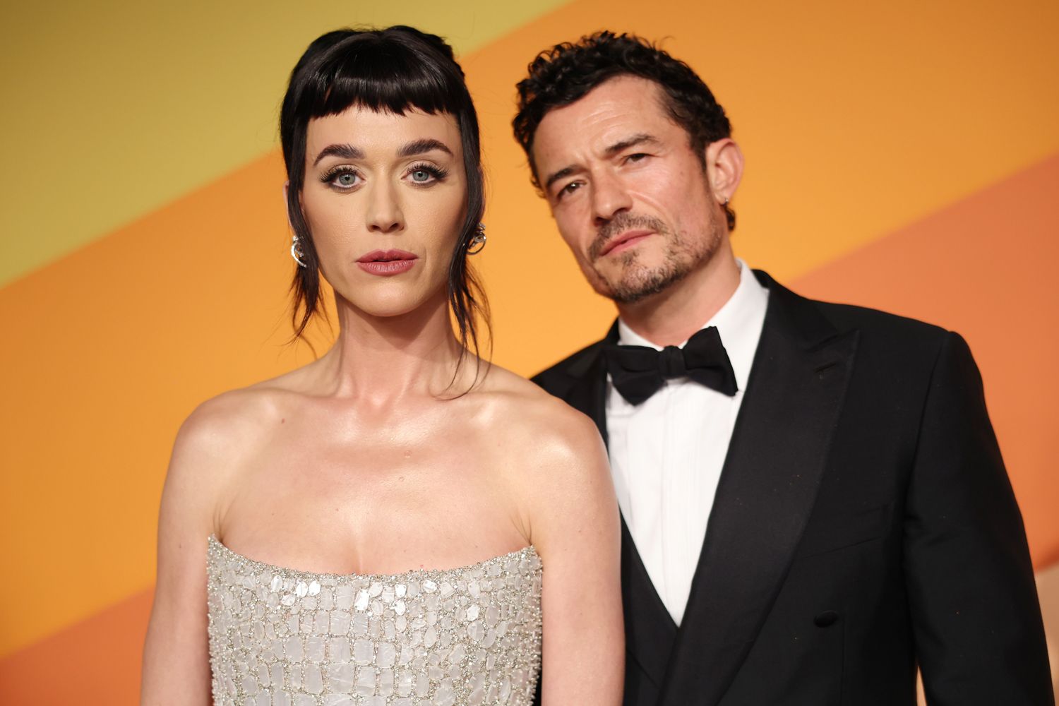 Katy Perry and Orlando Bloom attend the 2025 Vanity Fair Oscar Party Hosted By Radhika Jones at Wallis Annenberg Center for the Performing Arts on March 02, 2025 in Beverly Hills, California.