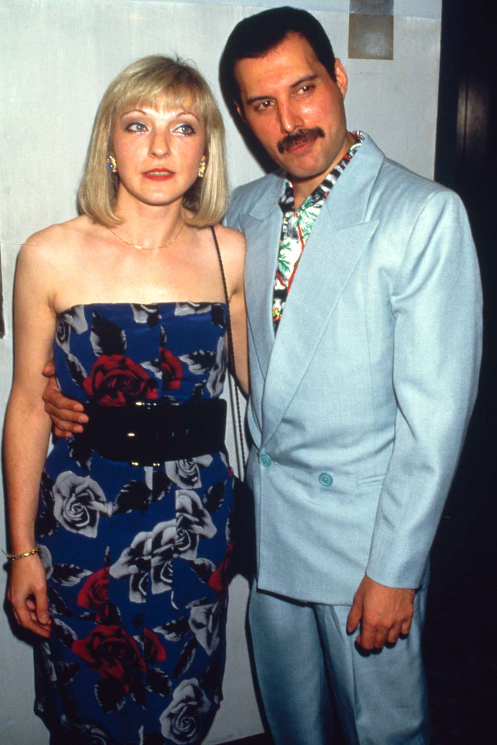 Singer Freddie Mercury with his friend Mary Austin at an after-party for Queen