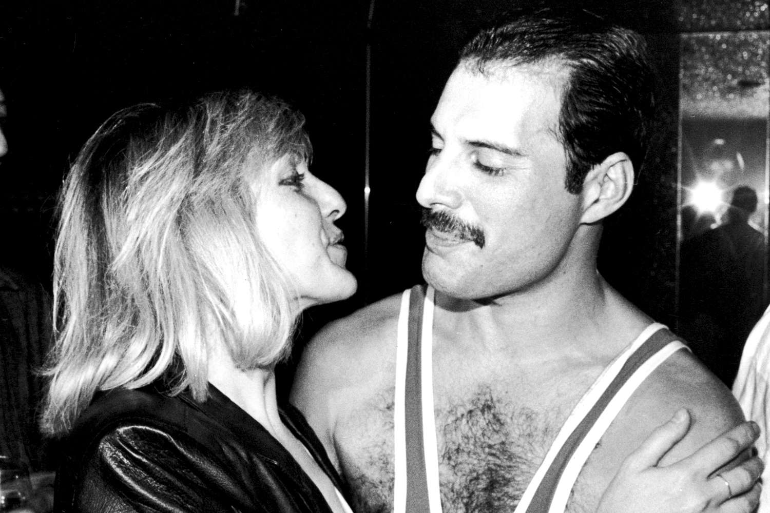 Freddie Mercury of British rock band Queen with Mary Austin, during Mercury