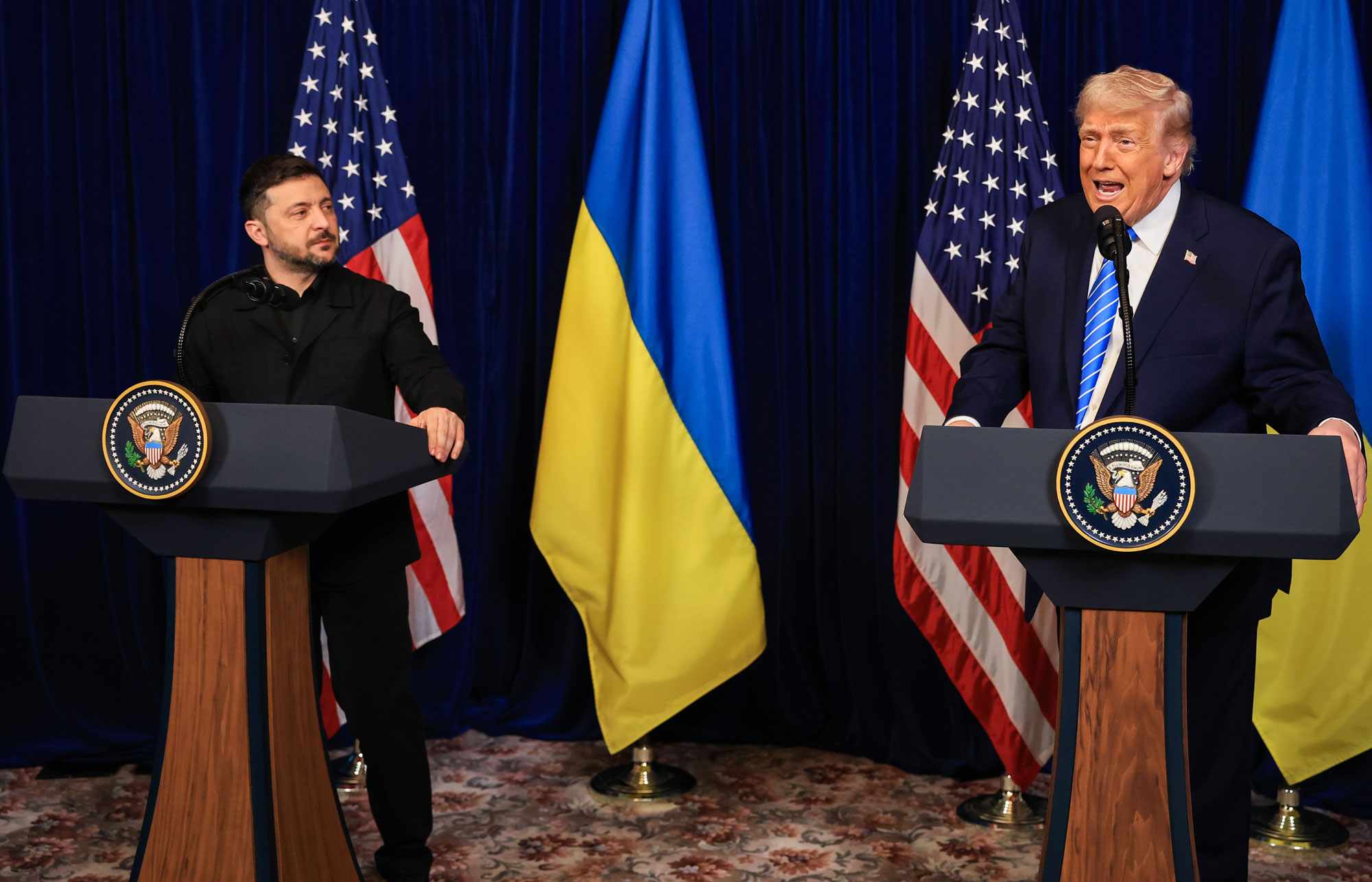 President Donald Trump speaks alongside Ukrainian President Volodymyr Zelensky during a news conference following their meeting at Trump’s Mar-a-Lago club on December 28, 2025
