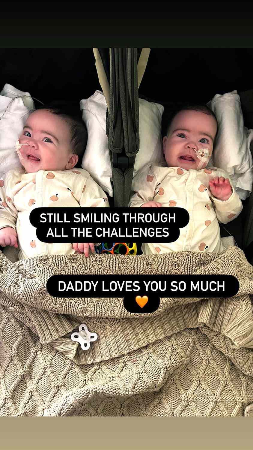 Zion Foster with his twin daughters