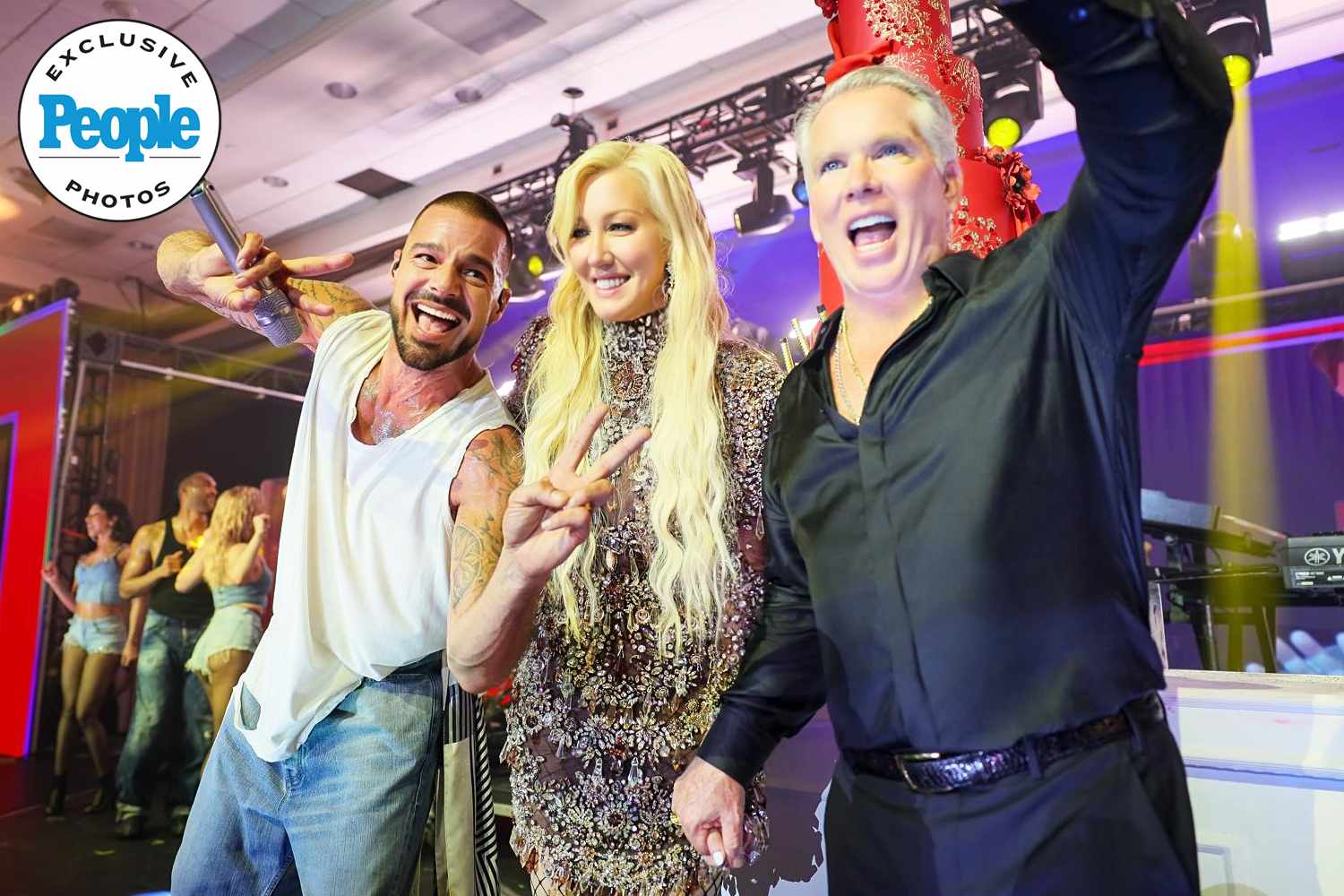 Ricky Martin, Dr. Elena Alvarez Westwood, and Thomas J. Henry at the engagement celebration