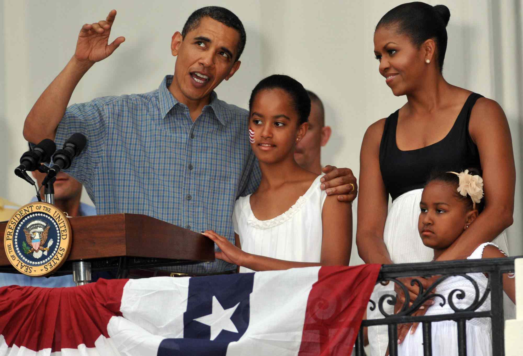 From left to right: Barack Obama, Malia Obama, Michelle Obama and Sasha Obama during an event to celebrate Independence Day and to honor military families on July 4, 2009