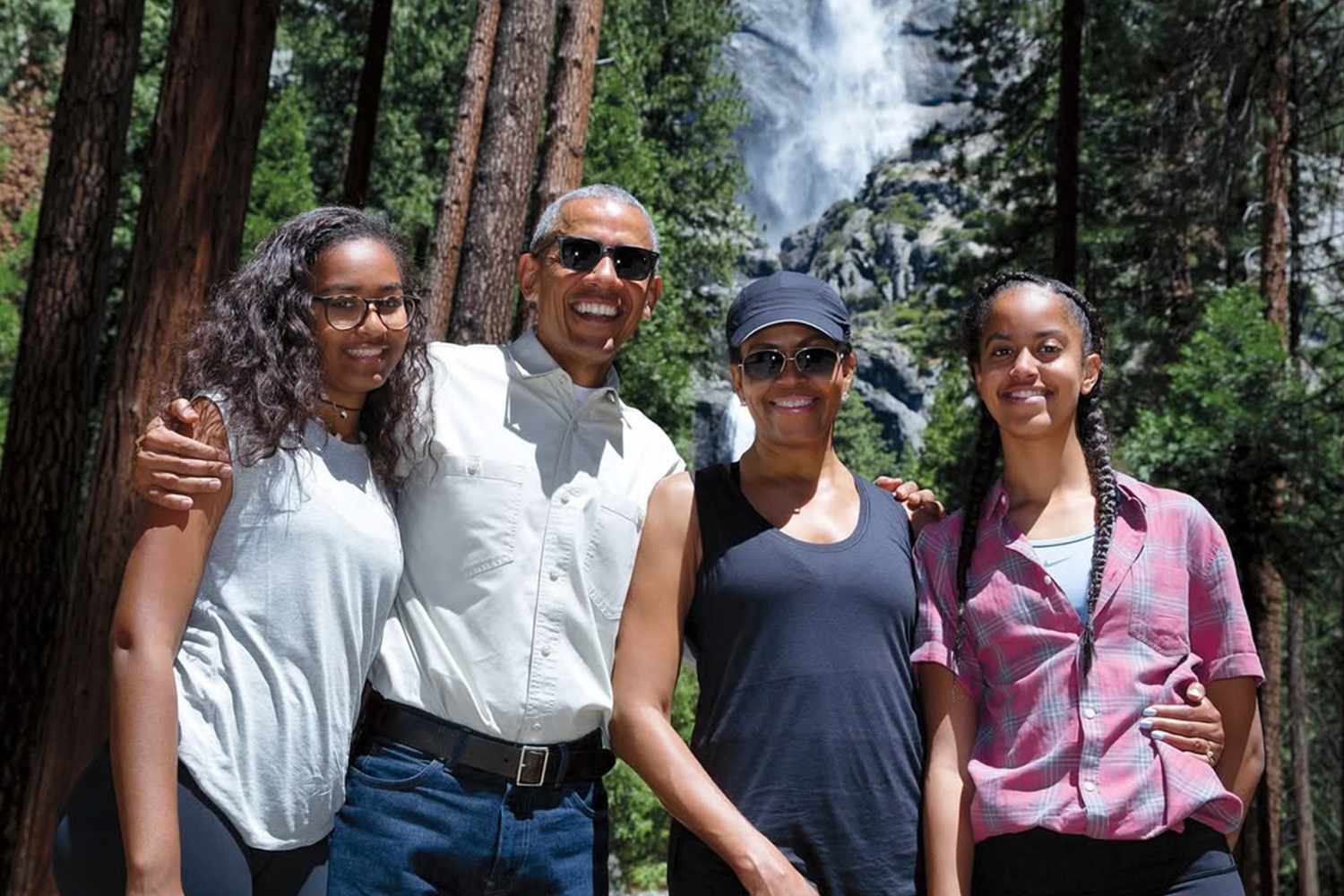 Sasha, Barack, Michelle, and Malia Obama.