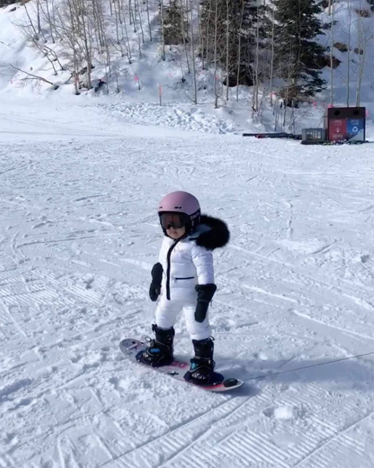 Stormi snowboarding
